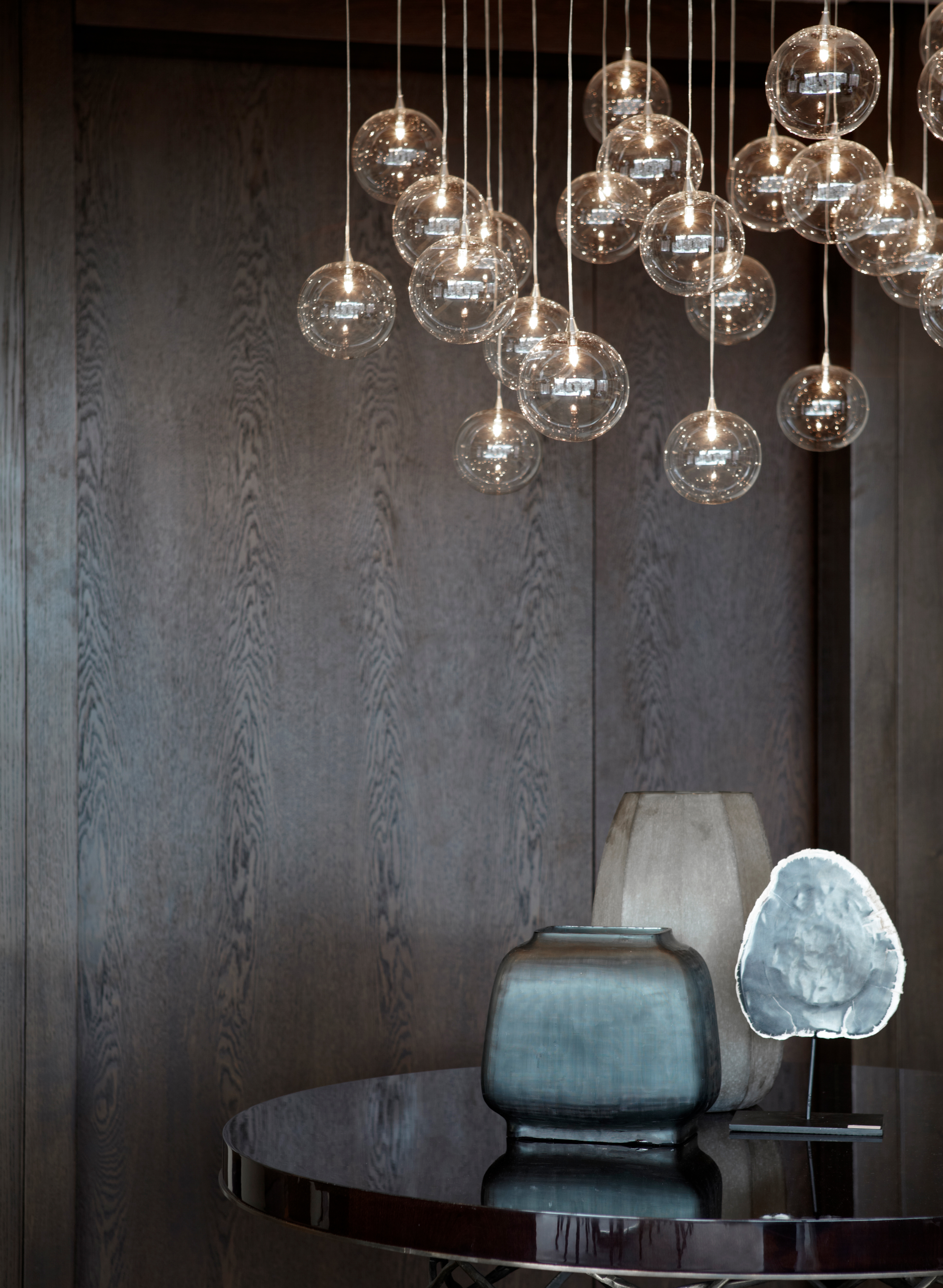 Pendant lighting above centre table in hallway