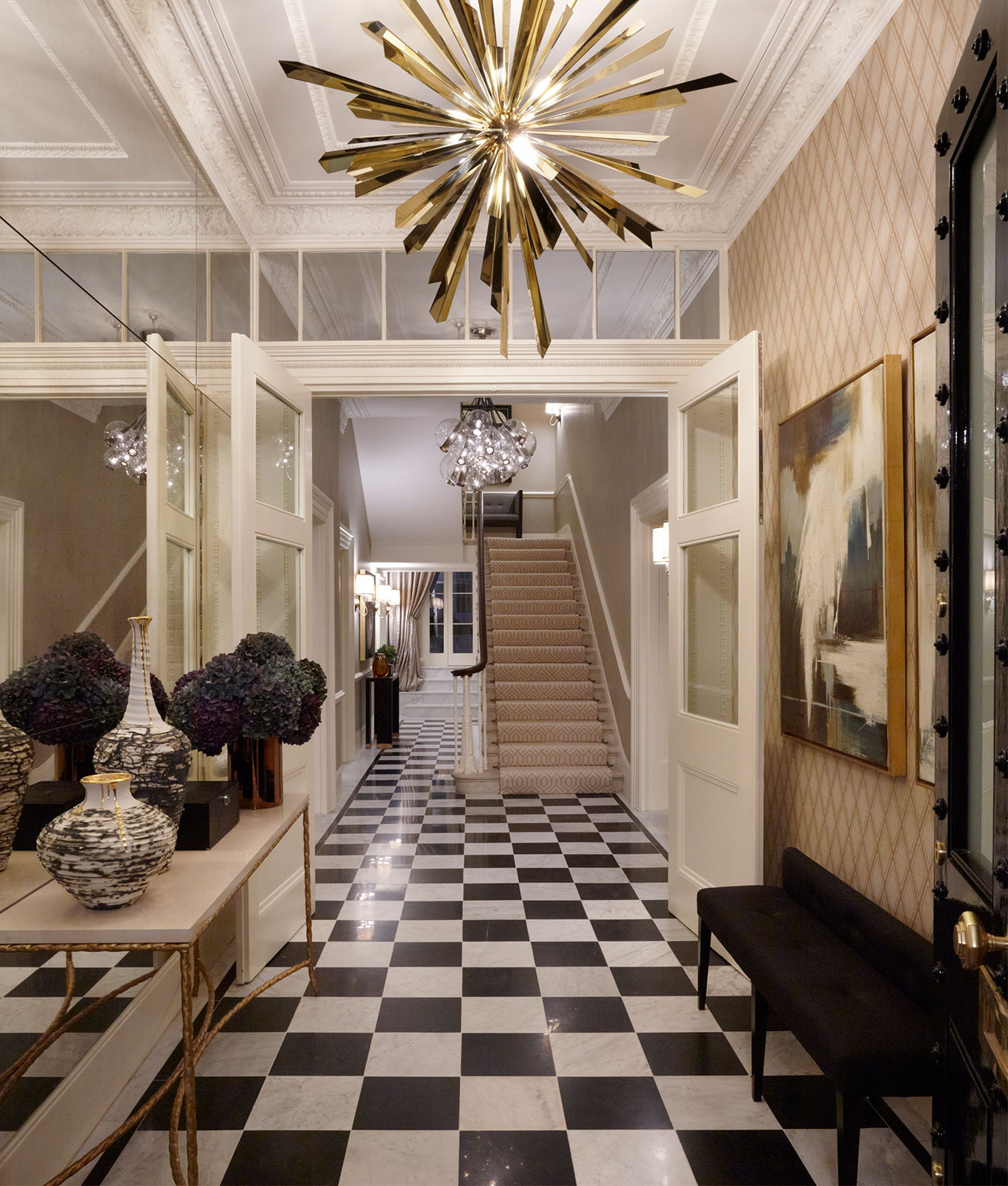 Entrance hall with dramatic sculptural chandelier